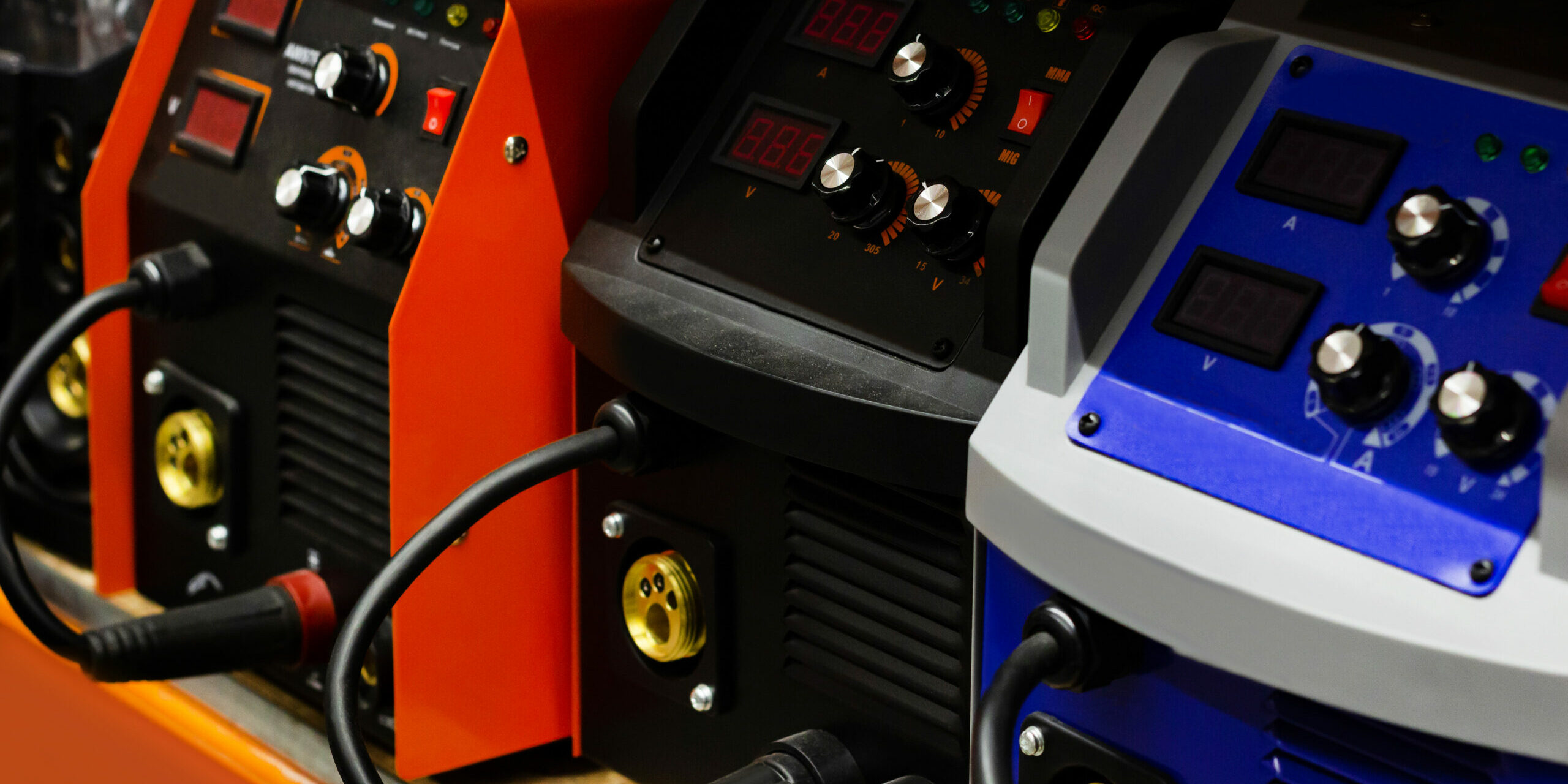 Photo,Of,Various,Type,Welding,Inverters,Standing,On,Construction,Supply