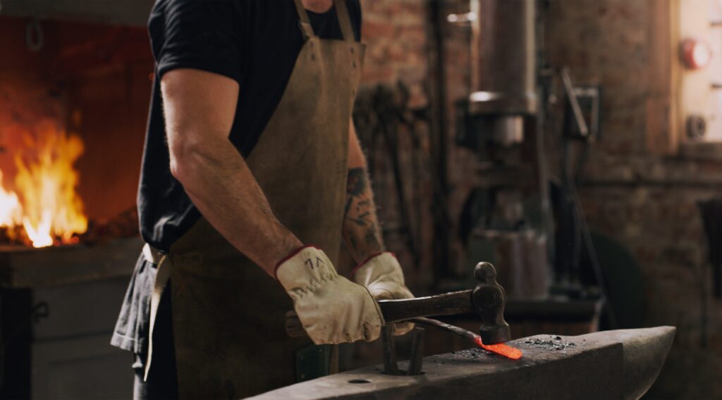 Blacksmith,,Man,And,Hands,With,Metal,,Hammer,And,Flame,With Blacksmith,,Man,And,Hands,With,Metal,,Hammer,And,Flame,With