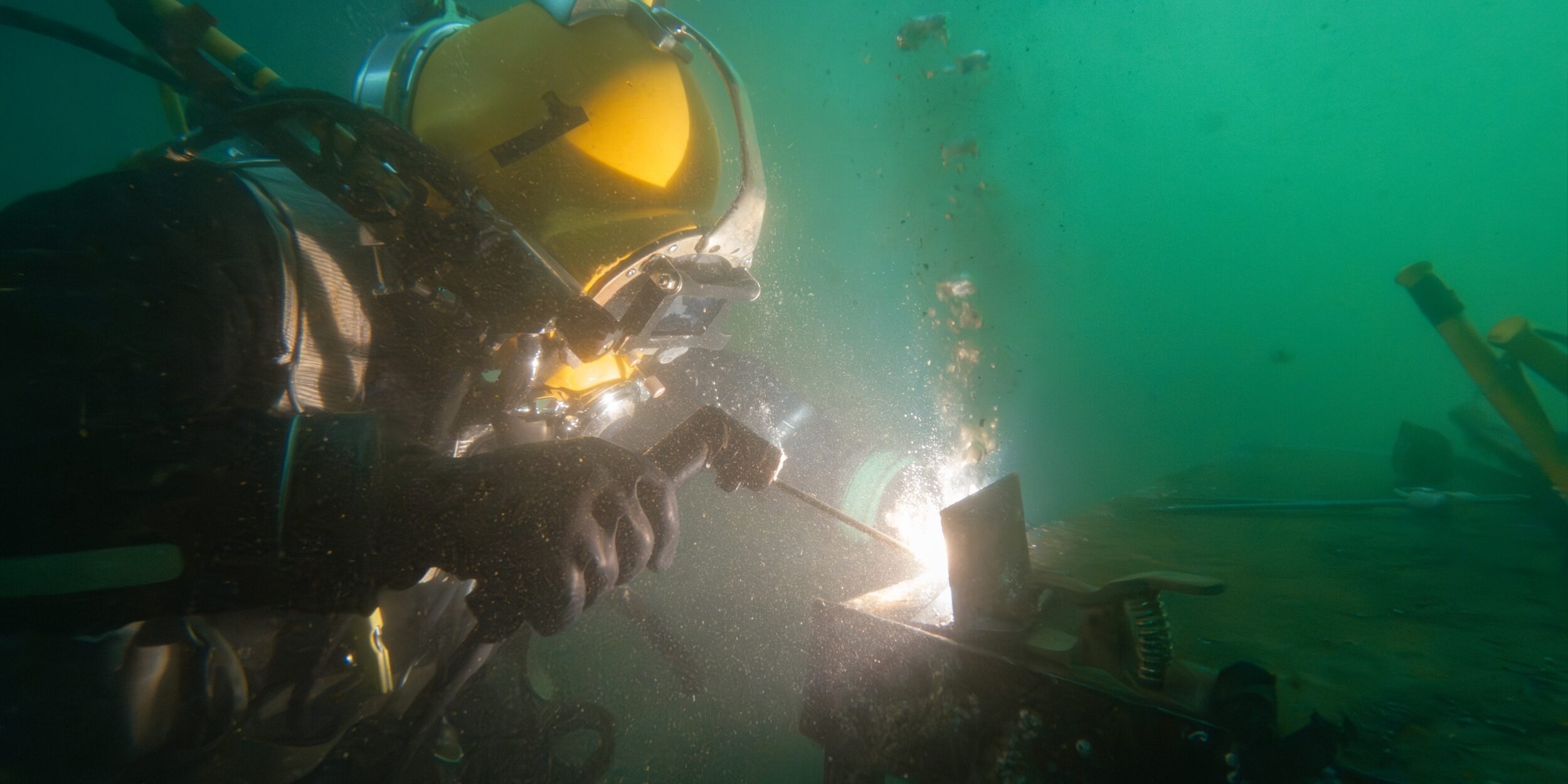 Underwater,Welding,In,Deep,Ocean,Depths,Closeup Subsea welding Underwater,Welding,In,Deep,Ocean,Depths,Closeup