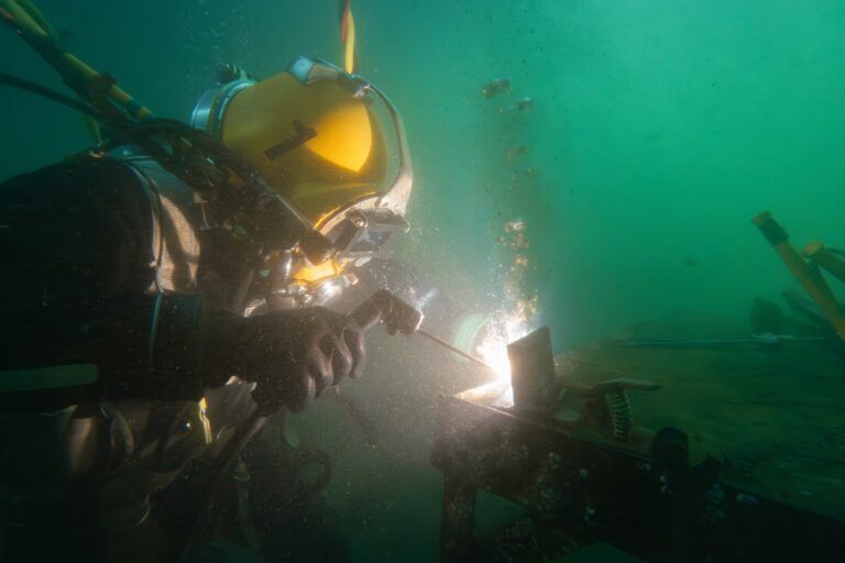 Underwater,Welding,In,Deep,Ocean,Depths,Closeup Subsea welding Underwater,Welding,In,Deep,Ocean,Depths,Closeup